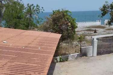Colorful enclosed patio with blue walls at beachfront house Playa Farallón Panama