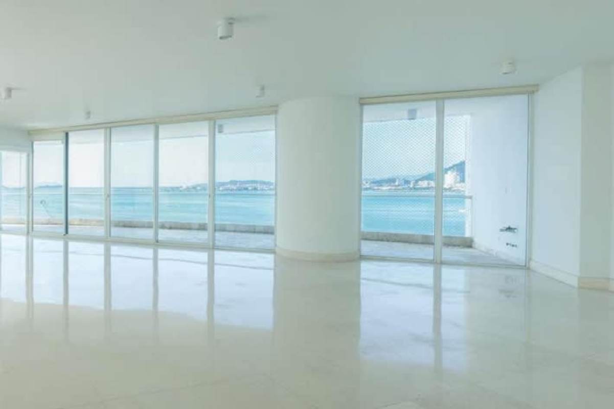 Marble bathroom with bathtub double sink and glass shower at The Point Punta Paitilla