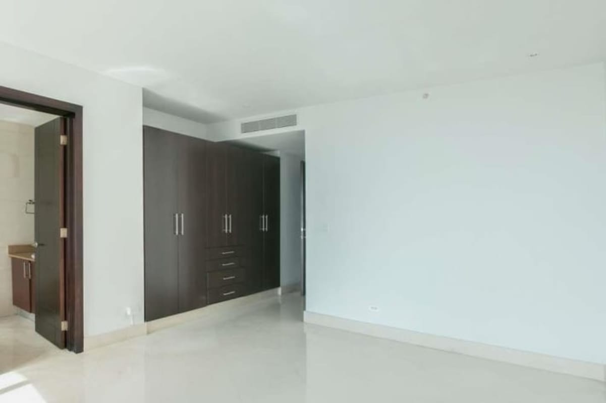 Luxury kitchen with granite countertops and center island at The Point Tower Punta Paitilla