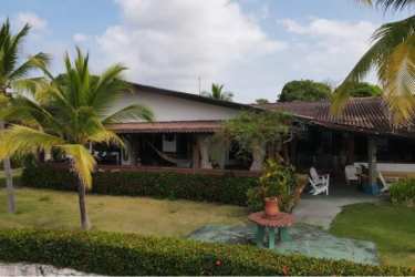 Private ranch-style coastal home with hammocks lush gardens near Pacific beachfront in Costa Esmeralda Panama