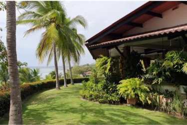 Beachfront mansion covered terrace, lush tropical garden, Pacific Ocean view Costa Esmeralda Panama