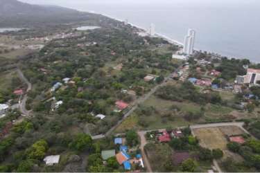 Coastal city Nueva Gorgona with high-rises, beach, lush green and mountain view Panama