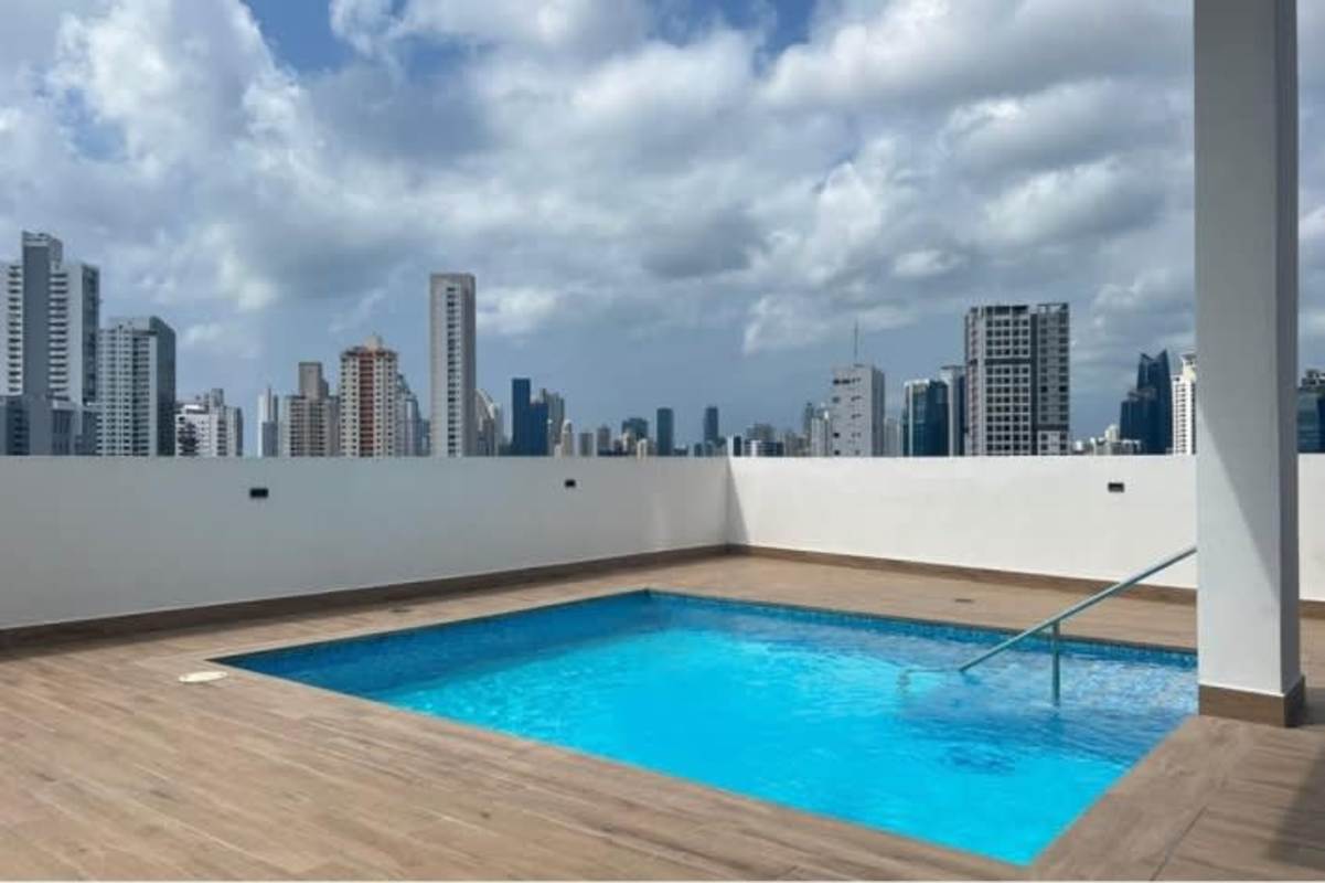 Elegant lobby with glass railing chandelier and reception PH Buona Vista Carrasquilla Panama City