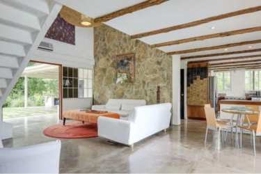 Outdoor covered terrace overlooking private pool in beach house at Costa Esmeralda Panama