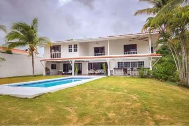 Rustic style gourmet kitchen with blue tile countertops and wood cabinetry PH El Cortijo Panama