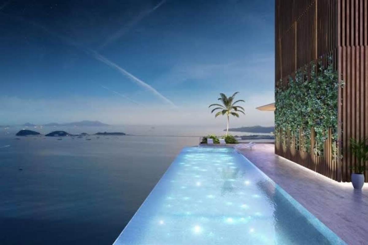 Open concept dining living room with panoramic ocean vista at The Towers Luxury Residences Panama City