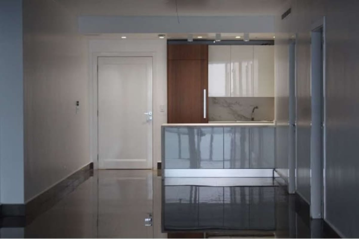 Bathroom featuring marble countertops and designer fixtures in PH Yoo Panama Panama City