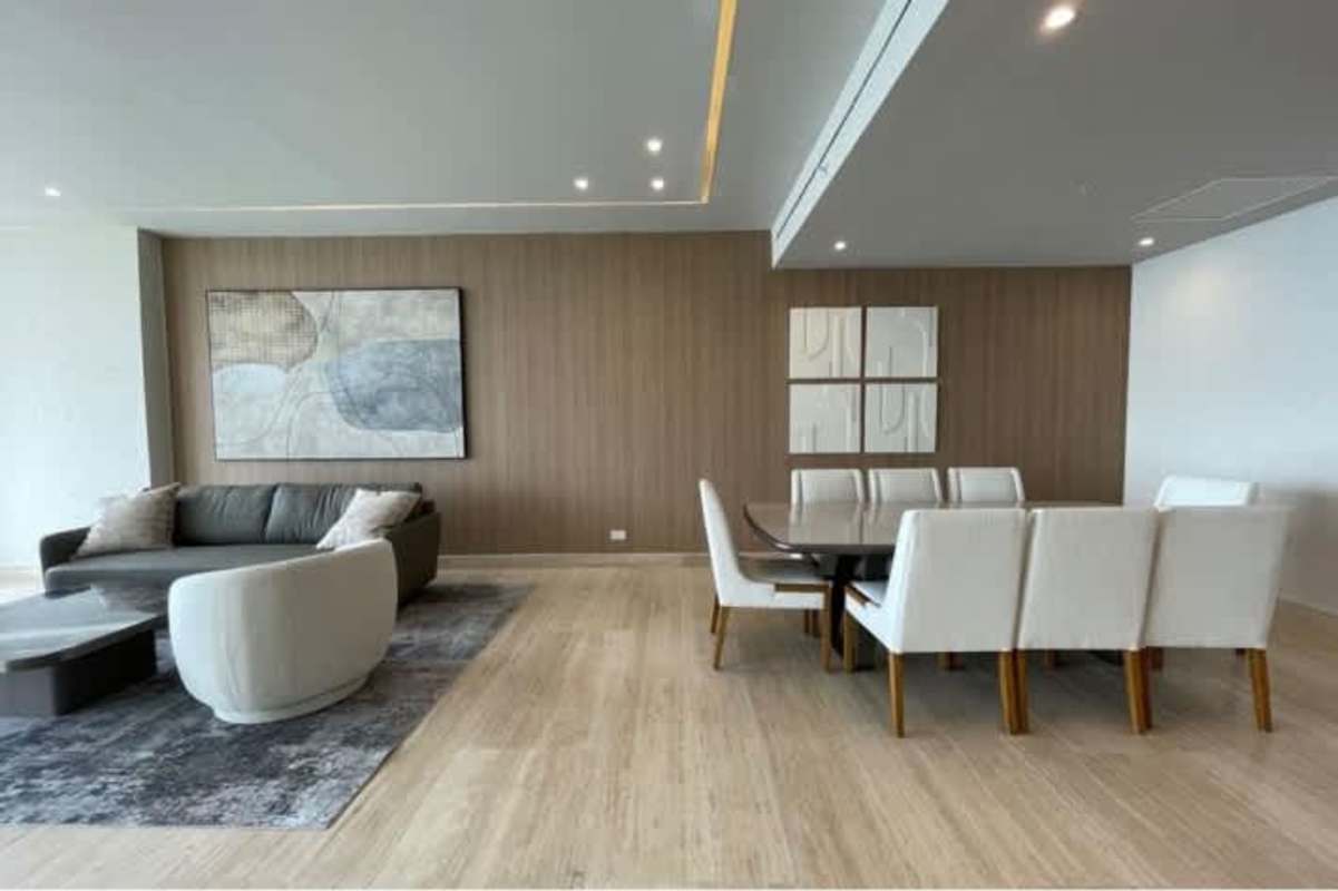 Spacious living and dining with floor-to-ceiling windows panoramic sea view in The Towers Punta Paitilla Panama