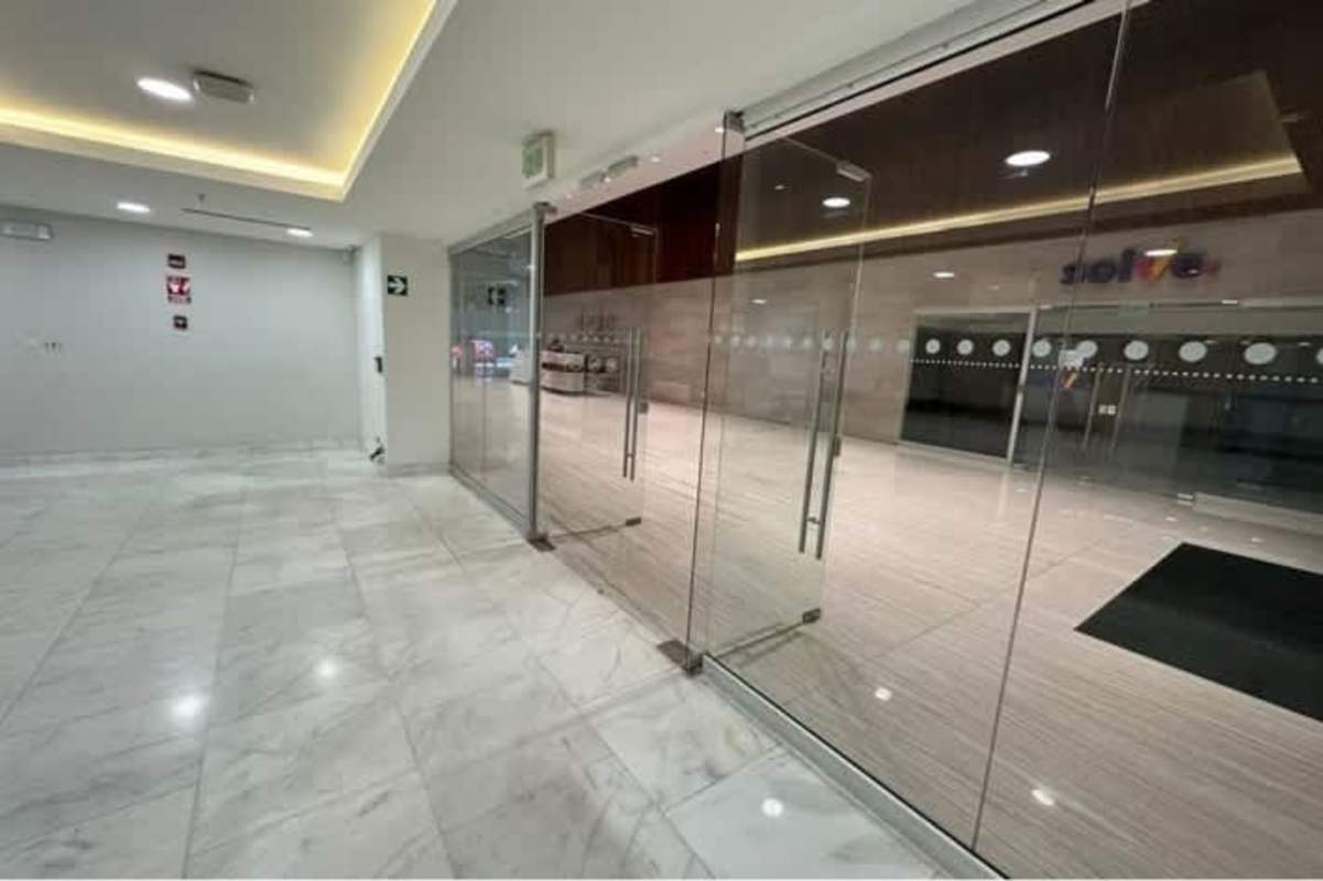 Ground floor commercial retail entrance with glass doors at Hi Point Offices Panama