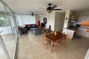 Spacious living dining area with ceiling fans and balcony Río Hato Panama
