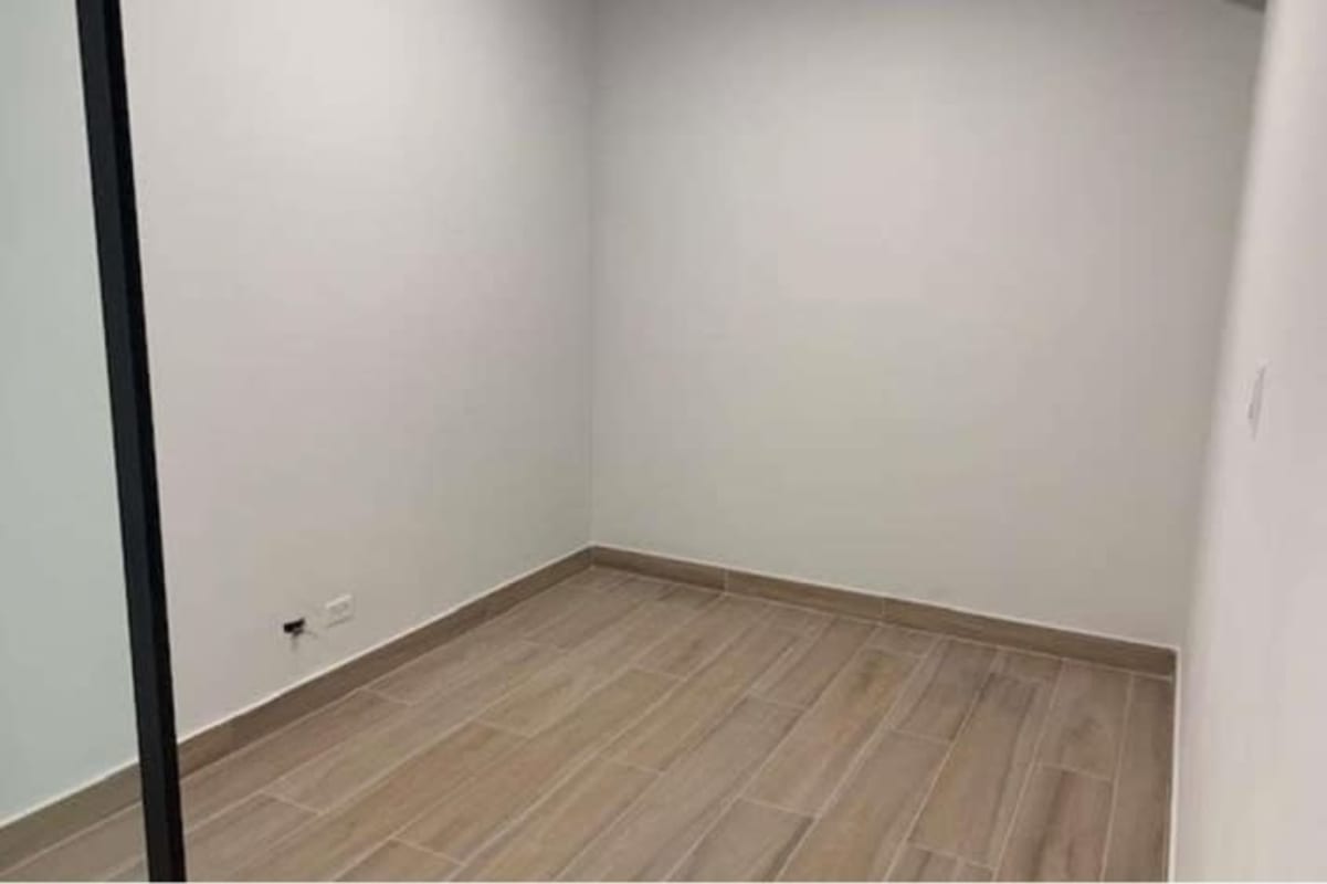 Private enclosed glass office room with tile flooring inside Tower Bank Panama