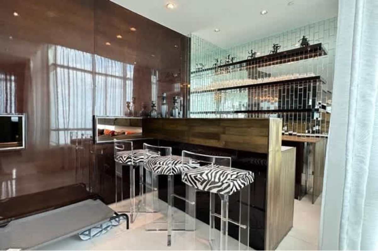 Luxury master bathroom featuring marble, double vanity, soaking tub, walk-in shower in Pacific Point Panama