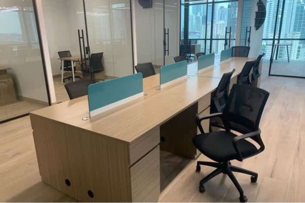 Private office space with glass walls and wooden flooring in Towerbank building Panama
