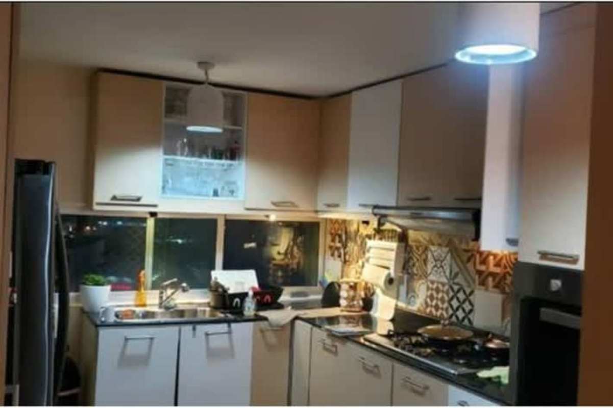 Stylish kitchen with tile backsplash, granite countertops, appliances in PH The Regent San Francisco Panama