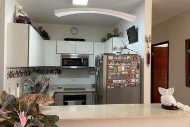 Furnished bedroom with window ocean view decor Panama real estate