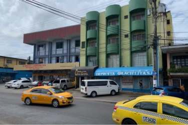 Street view of hotel with shops La Chorrera downtown Panama Oeste