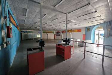 Rustic Mediterranean entrance facade main access Panama warehouse retail