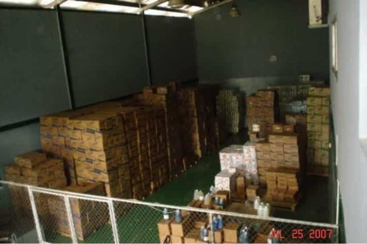Spacious warehouse storage area with stacked pallets fenced section Rio Abajo commercial rental