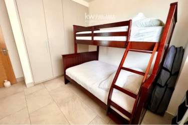 Bright master bedroom with large windows and sea view Playa Escondida Resort condo Panama