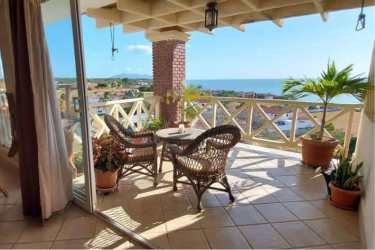 Open living dining area with high ceilings and natural light in Penthouse Vista Mar Panama