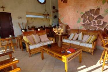 Elegant master suite with balcony overlooking marina, ocean, and mountains at Vista Mar Penthouse Panama