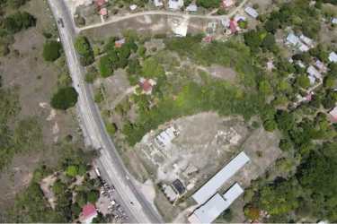 Two-story office building with adjacent warehouse and open lot in El Coco Penonomé