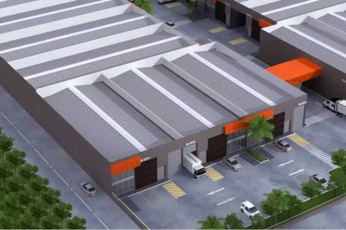 Aerial view of modern industrial park 24 de Diciembre with warehouses logistics parking