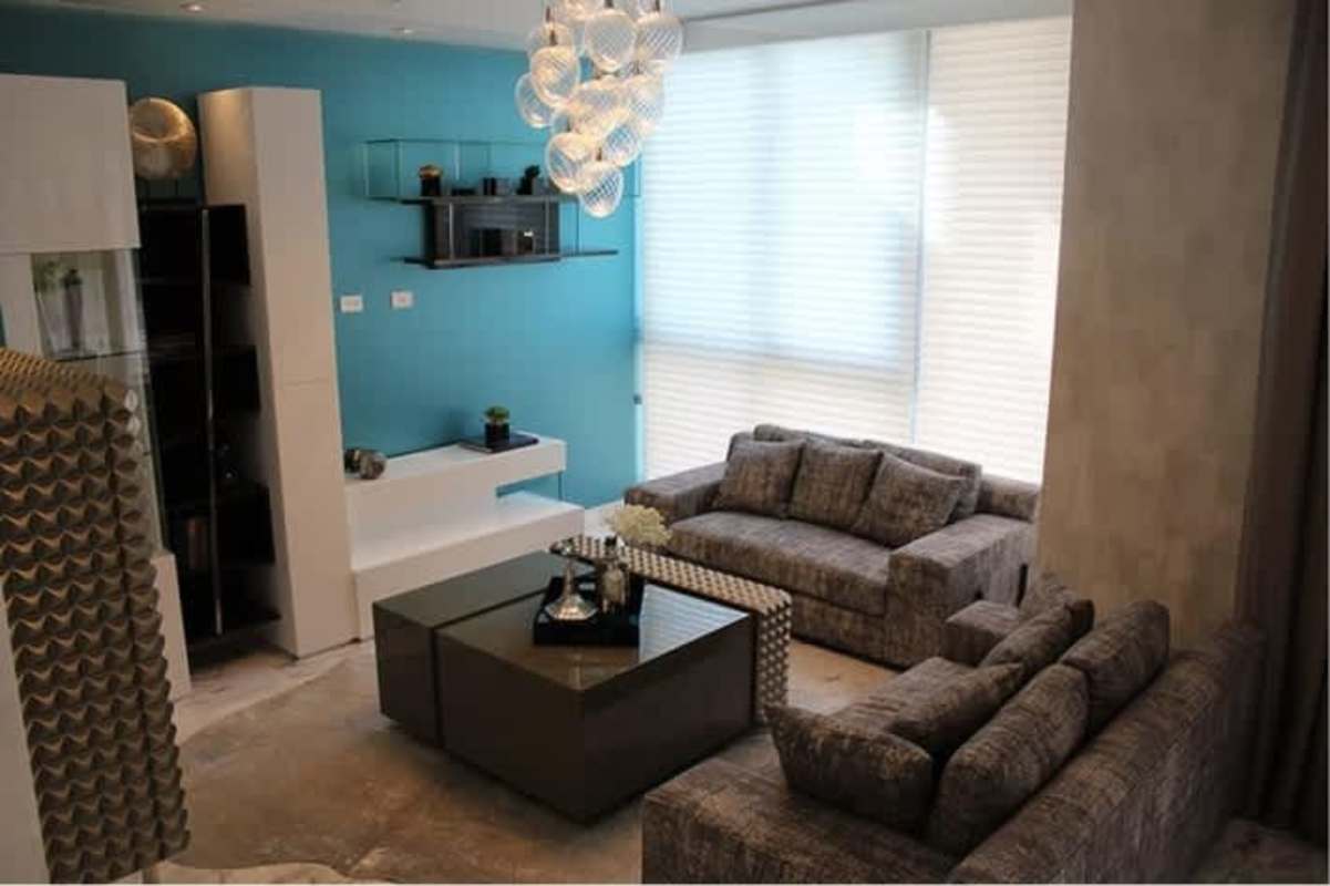 Spacious living room with floor-to-ceiling windows in PH Regalia Costa del Este Panama