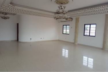 Open plan living room with dual chandeliers, tiled floors at PH Montelirio Colon Panama