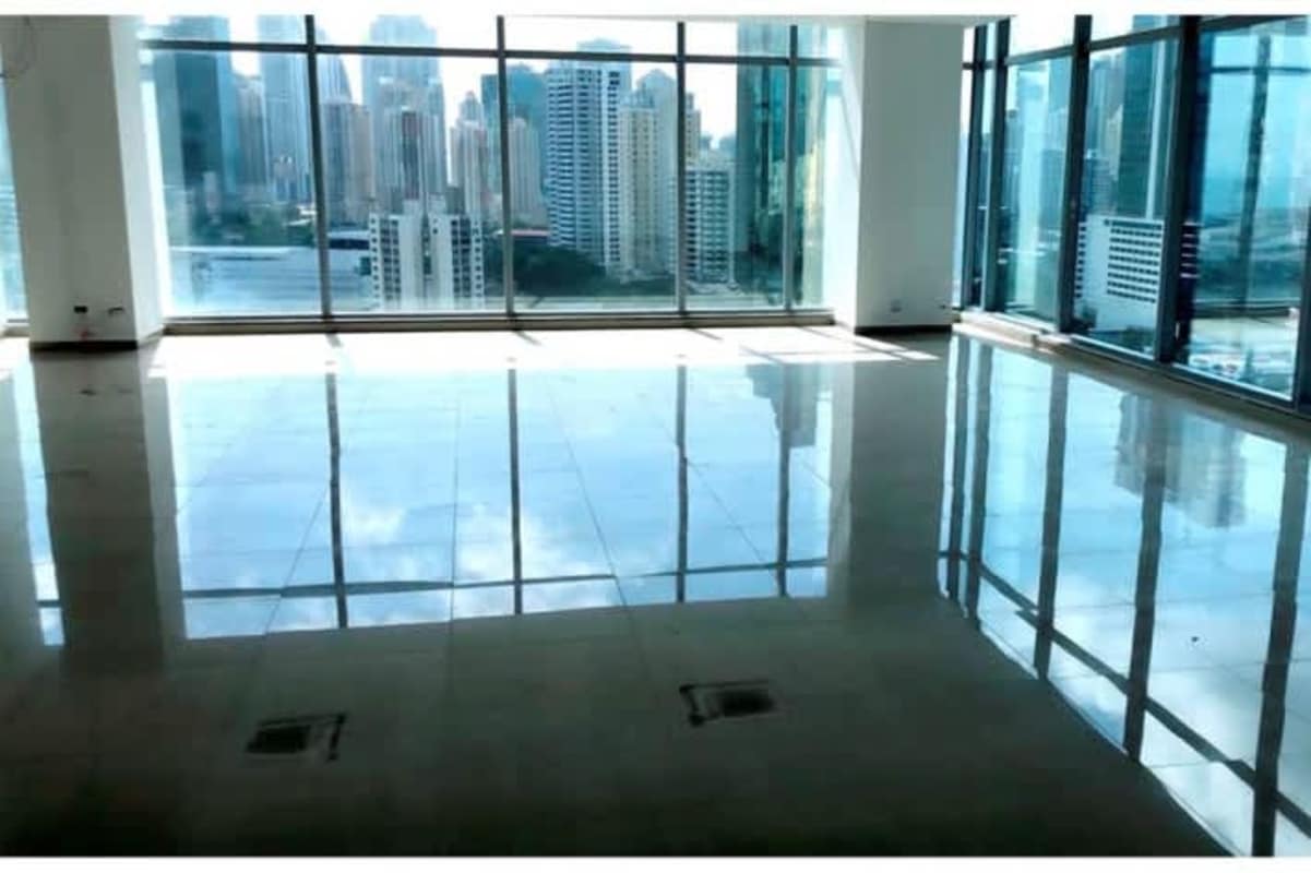 Bright corner corporate office floor-to-ceiling windows skyline views PH Panama Business Tower Obarrio Panama