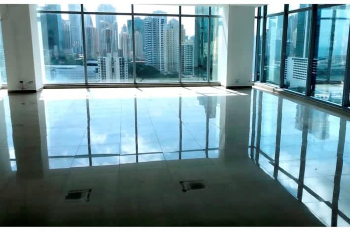 Modern corporate office entrance with canopy and glass facade Panama Business Tower Obarrio