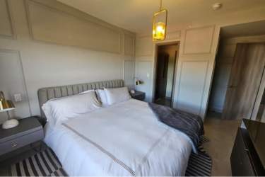 Spacious master bedroom with walk-in closet, modern decor PH Madeira Panama Pacifico