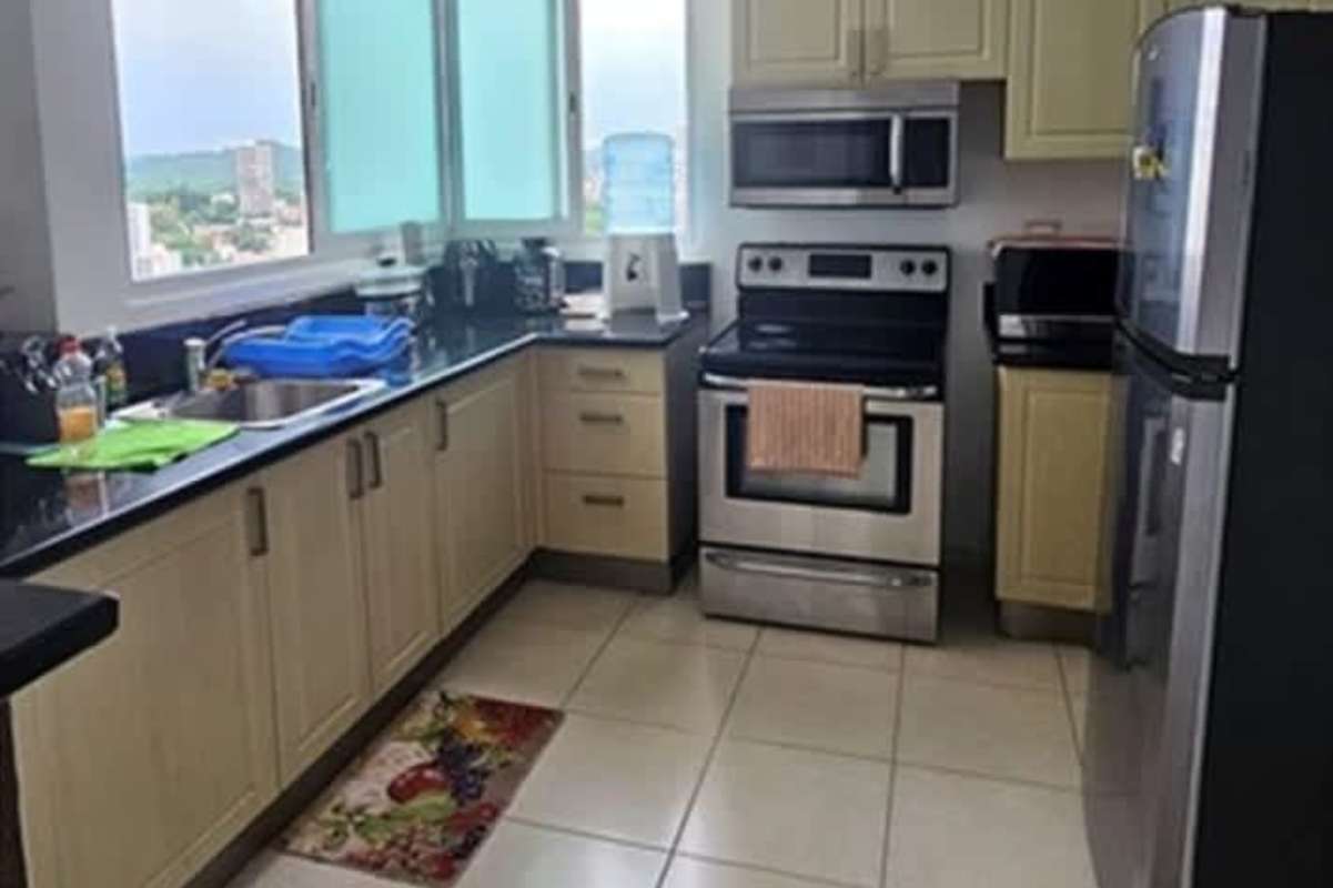 Kitchen with granite breakfast bar, appliances, ocean views in PH Vista Marina Panama