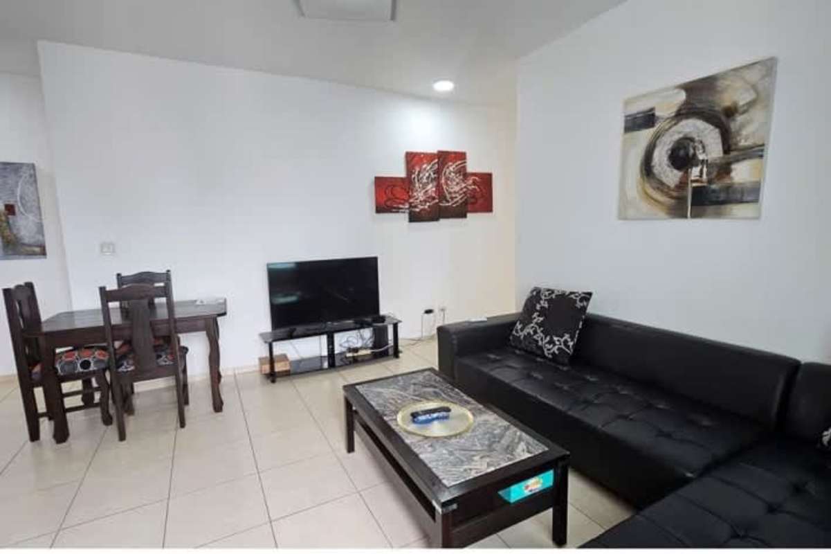 Furnished living dining area with large windows ocean view in PH Vista Marina Panama City