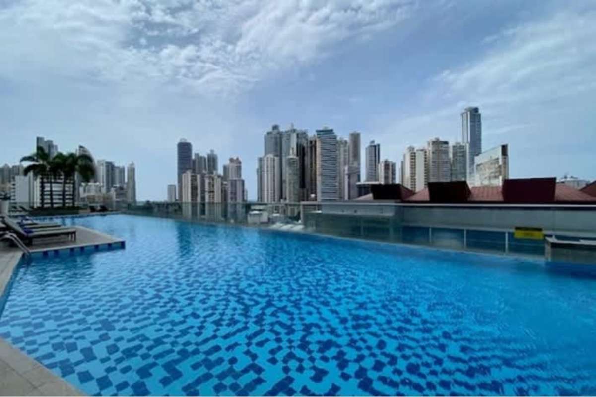 Modern glass high-rise skyscraper Megapolis Tower along Avenida Balboa Panama City