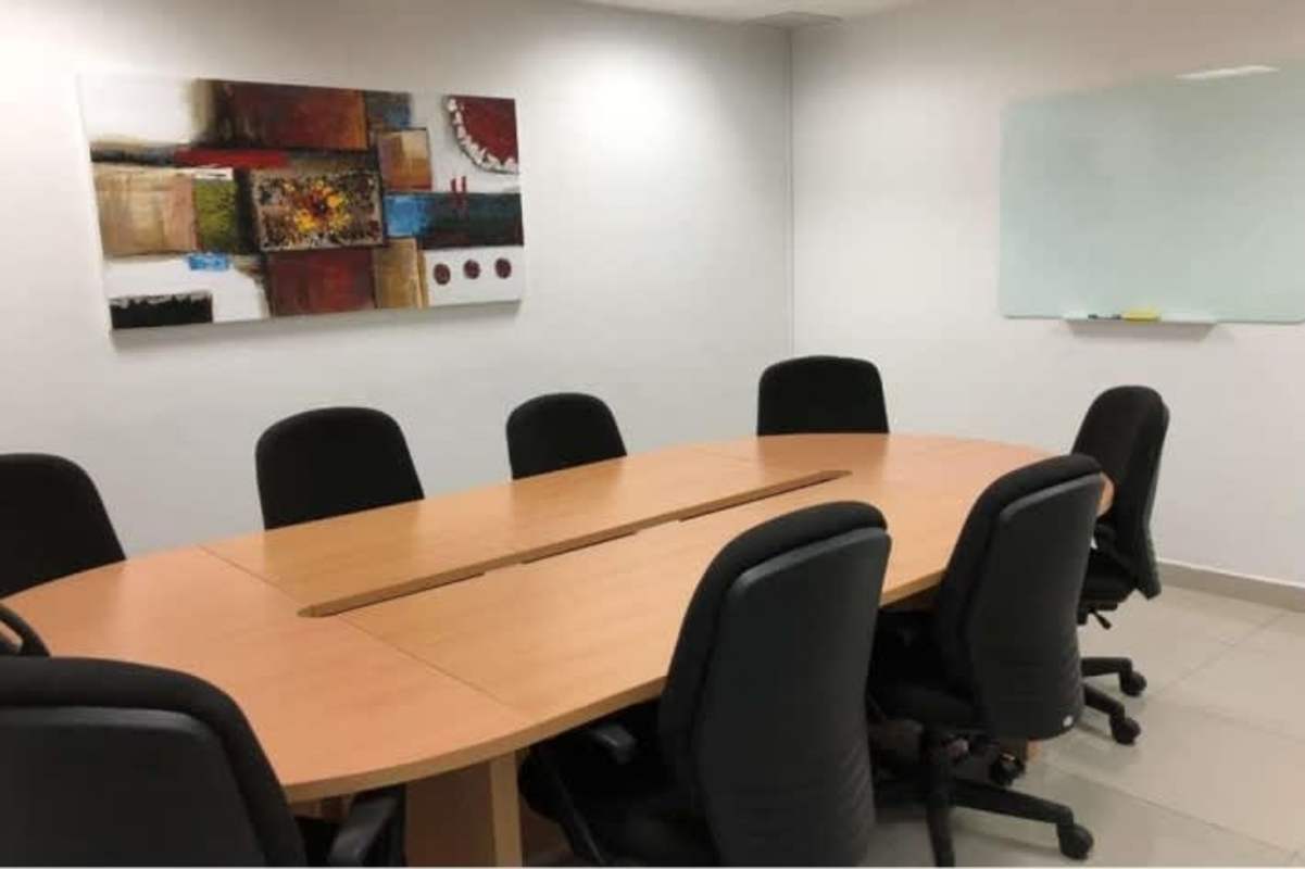 Compact kitchenette with sink and cabinets in commercial office in PH Global Bank Tower Panama