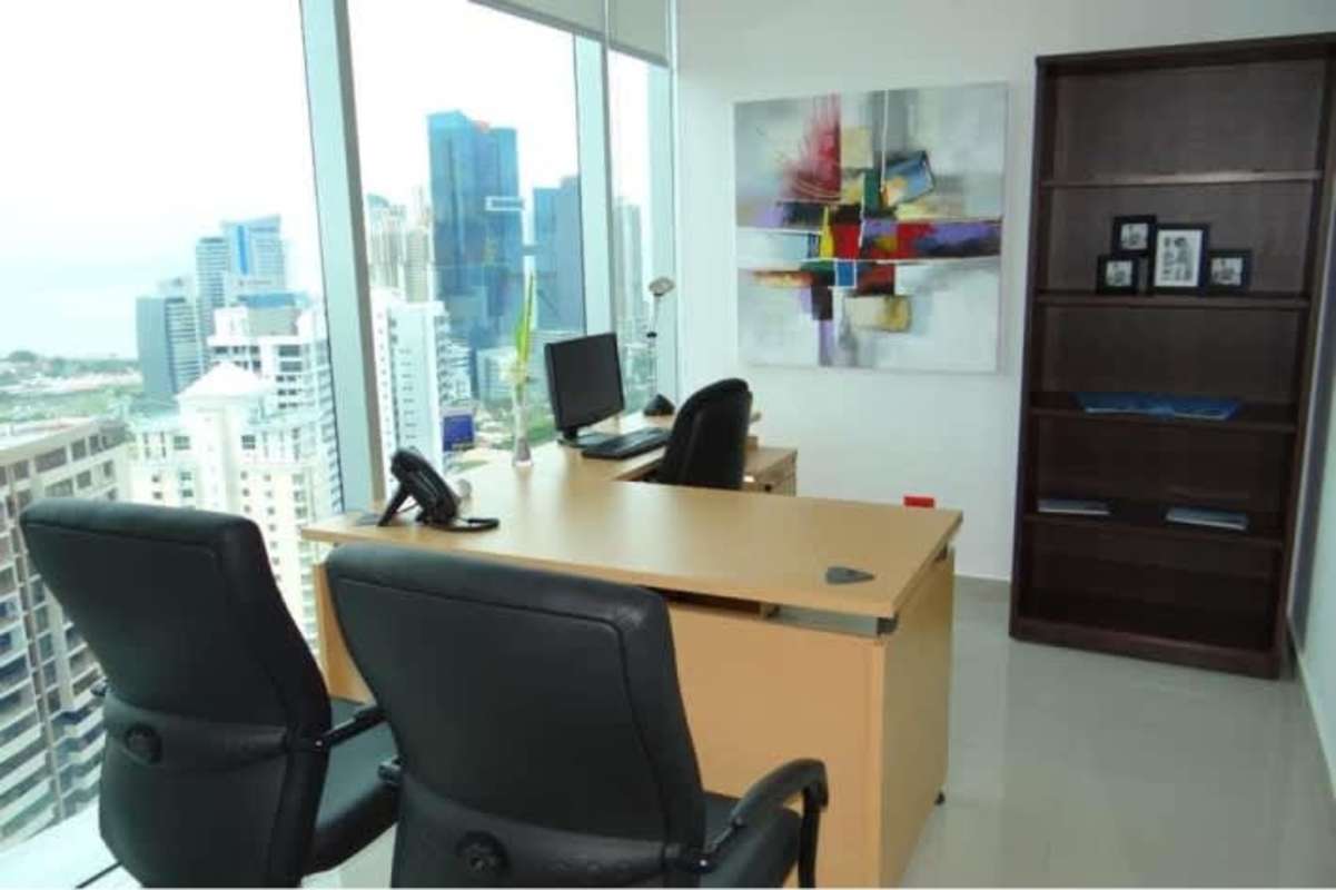Modern conference room with large table, office chairs, and whiteboard in PH Global Bank Tower, Panama City