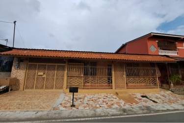 Traditional kitchen featuring brick arch, white cabinetry and tiled countertop house for sale La Chorrera Panama