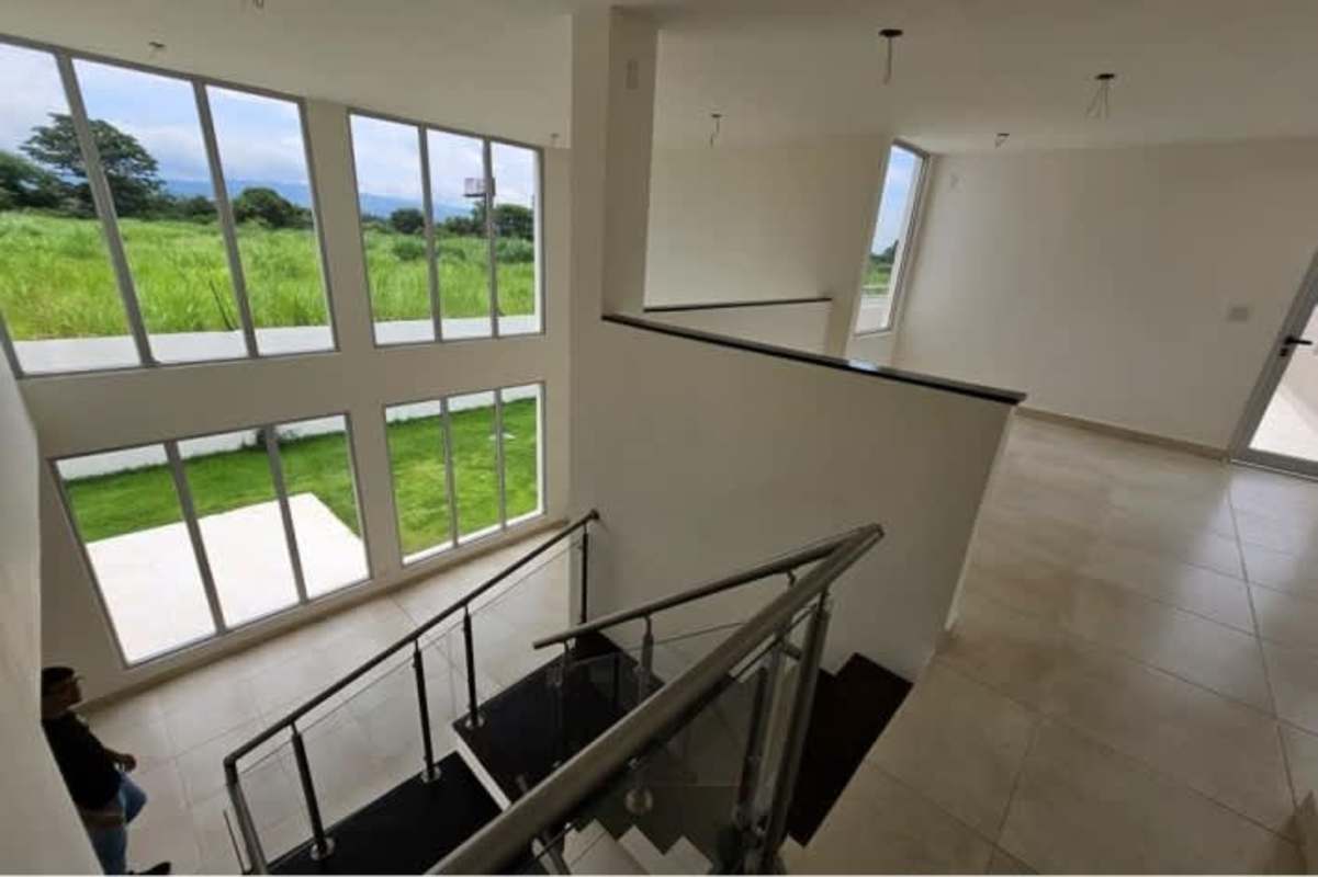 Spacious modern bathroom with double vessel sinks and glass-enclosed shower Villa Sur Costa Sur Panama