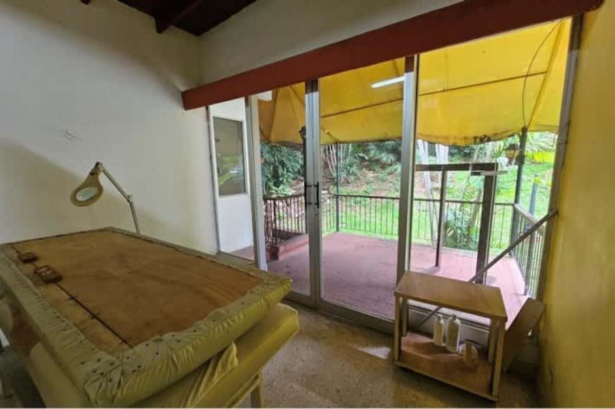 Treatment room interior with equipment window suitable for clinic or therapy use in Panama commercial property