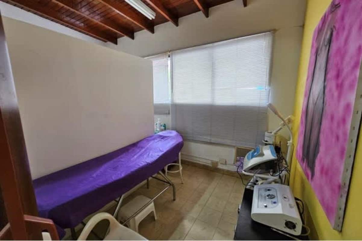 Kitchen space with window and island in commercial property in El Cangrejo Panama