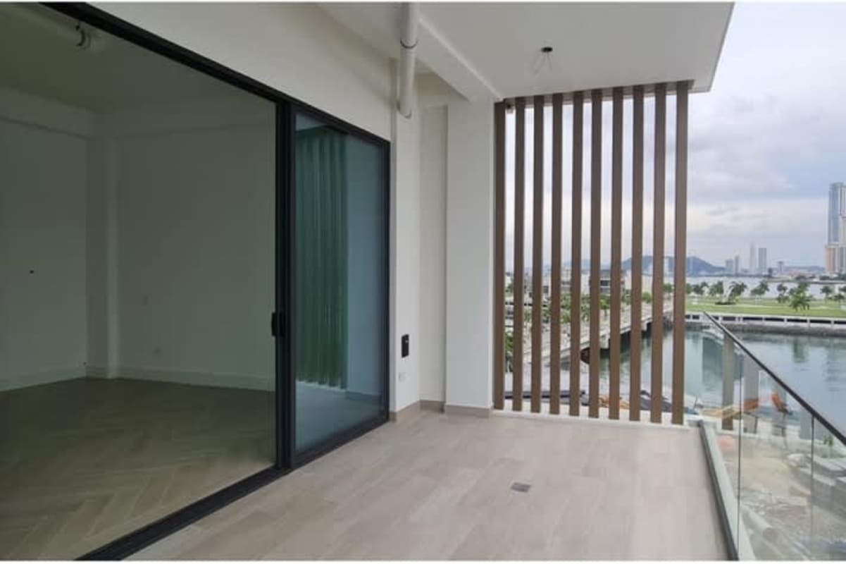 Bright open-plan living with skyline view windows Ocean Villas Ocean Reef