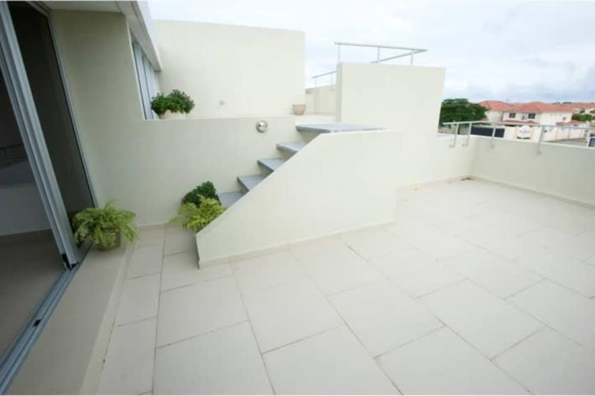 Modern kitchen with granite countertops and ample cabinetry Costa Sur Village Panama