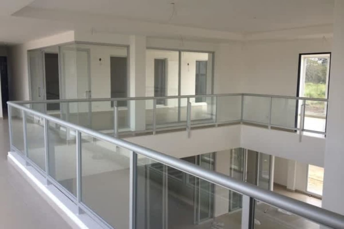 Open dining area adjoining the bright living room Costa Sur Village Panama