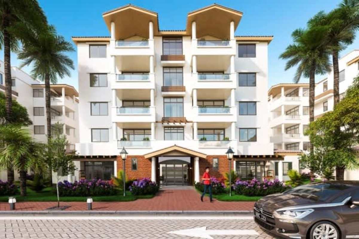 Contemporary apartment tower exterior with balconies and green areas PH Costamare Costa Sur Panama