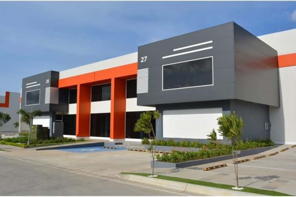 Facade of modern warehouse units with parking areas at Panapark Free Zone Panama