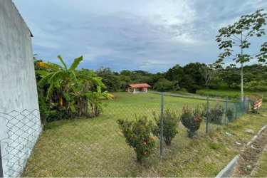 Traditional open air bohio with covered space on grassy land near Pacific Beaches Panama