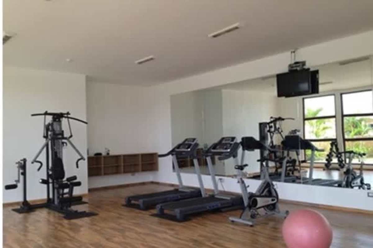 Covered terrace overlooking private garden in luxury house at Sunset Coast Costa Sur Panama