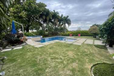 Large covered terrace overlooking private pool lush green garden Villa Decameron Río Hato Panama