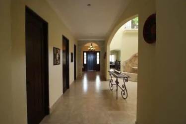 Contemporary kitchen with granite counters, stainless appliances in luxury villa Panama